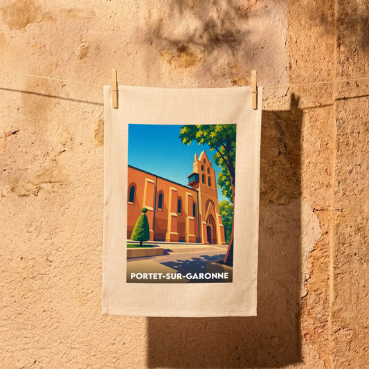 Torchon souvenir de la ville de Portet-sur-Garonne avec une illustration stylisée de son église.