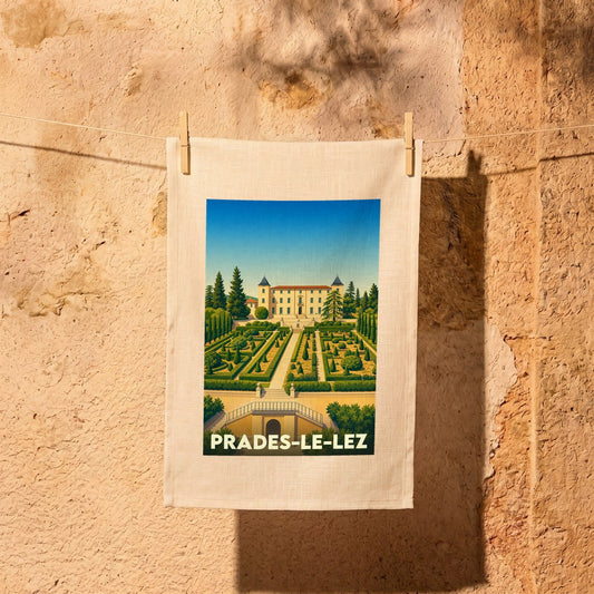 Torchon souvenir de la ville de Prades-le-Lez avec une illustration stylisée d'un château et de ses jardins.
