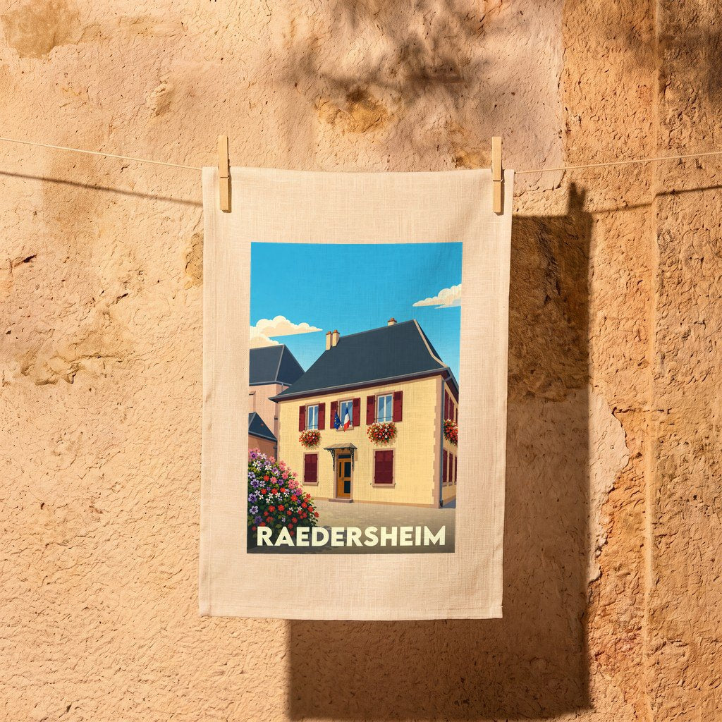Torchon souvenir de la ville de Raedersheim avec une illustration stylisée d'une maison alsacienne.
