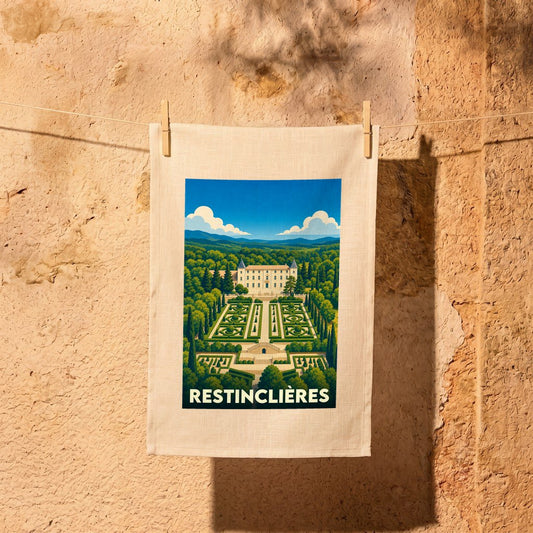 Torchon souvenir du domaine départemental de Restinclières avec une illustration de style affiche vintage.