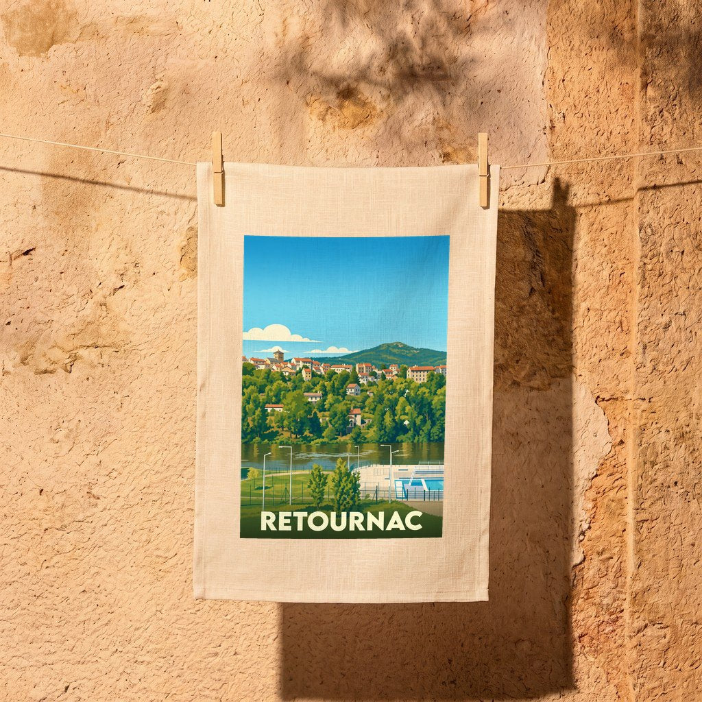 Torchon souvenir de la ville de Retournac avec une illustration paysagère stylisée.
