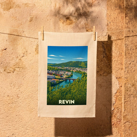 Torchon souvenir de la ville de Revin avec une illustration stylisée.