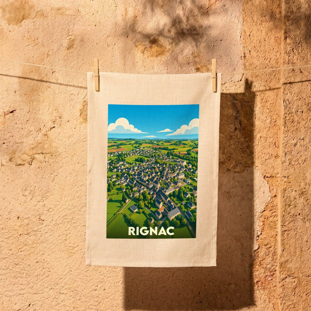 Torchon souvenir de la ville de Rignac avec une illustration stylisée vue du ciel.