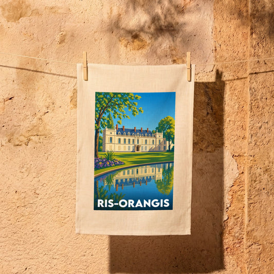 Torchon souvenir de la ville de Ris-Orangis avec une illustration stylisée de château se reflétant dans l'eau.