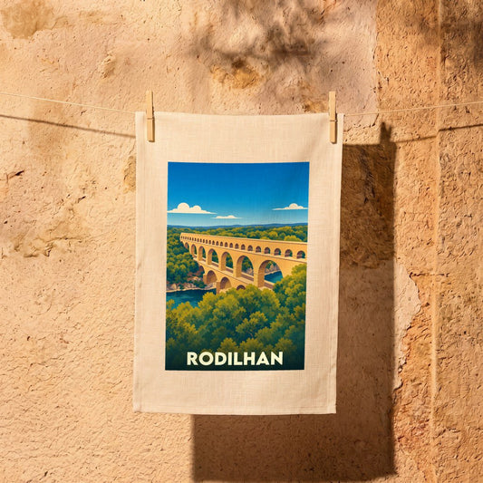Torchon souvenir de la ville de Rodilhan illustré d'une vue stylisée du Pont du Gard.