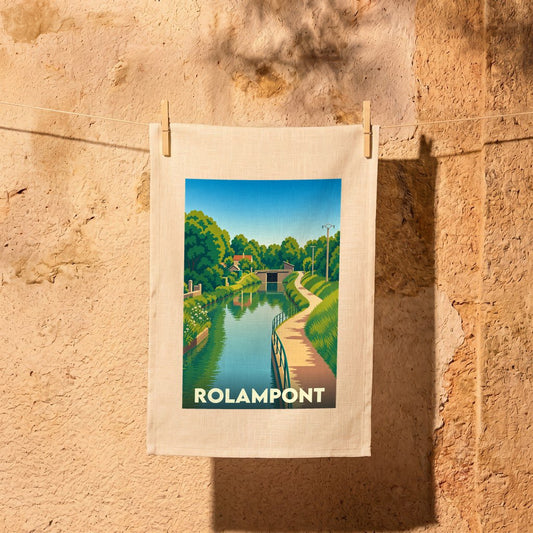 Torchon souvenir de la ville de Rolampont avec une illustration stylisée représentant son canal.