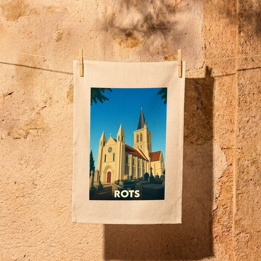 Torchon souvenir de la ville de Rots avec une illustration stylisée de son église.