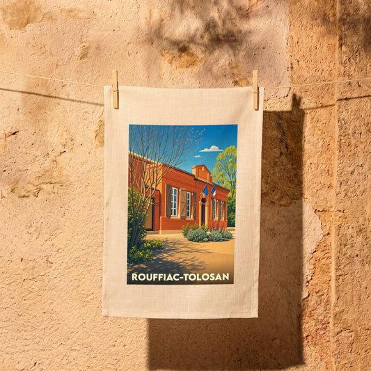 Torchon souvenir de la ville de Rouffiac-Tolosan avec une illustration stylisée.