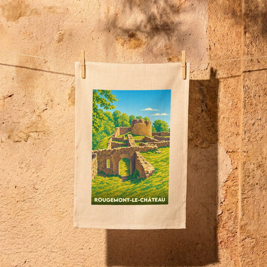 Torchon souvenir de la ville de Rougemont-le-Château avec une illustration stylisée de ses ruines médiévales.