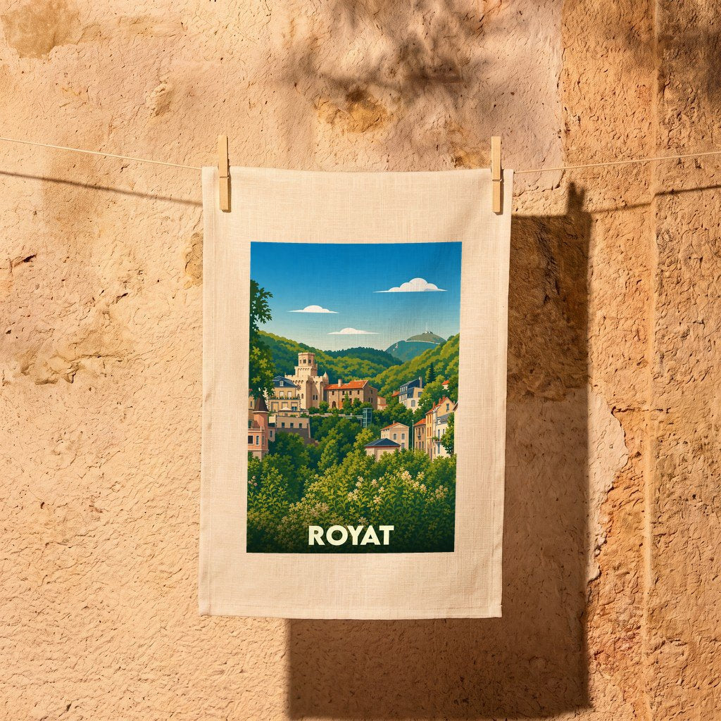 Torchon souvenir de la ville de Royat orné d'une illustration stylisée de ses paysages et bâtiments historiques.
