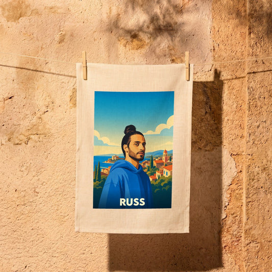 Torchon souvenir de la ville de Russ avec une illustration stylisée.
