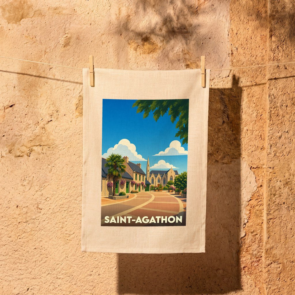 Torchon souvenir de la ville de Saint-Agathon orné d'une illustration stylisée et colorée.