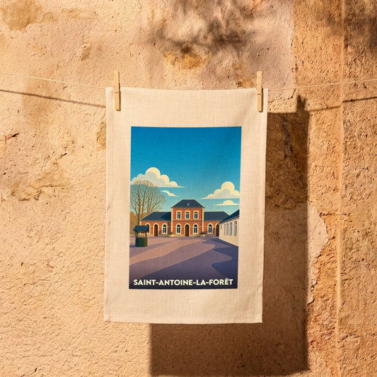 Torchon souvenir de la ville de Saint-Antoine-la-Forêt avec une illustration stylisée.