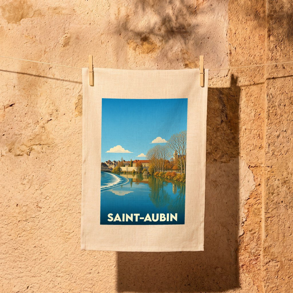 Torchon souvenir de la ville de Saint-Aubin avec une illustration stylisée d'un paysage de bord de l'eau.