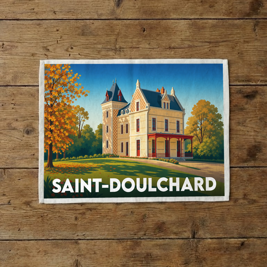 Torchon souvenir de la ville de Saint-Doulchard illustré d'un manoir entouré de couleurs automnales.