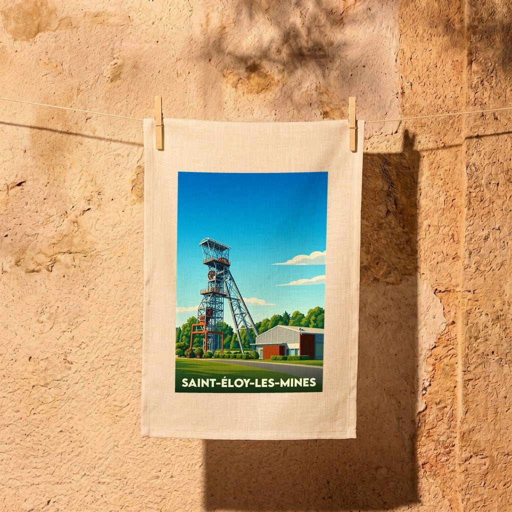 Torchon souvenir de la ville de Saint-Éloy-les-Mines avec une illustration stylisée d'un puits de mine.