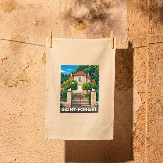 Torchon souvenir de la ville de Saint-Forget avec une illustration stylisée d'une maison de maître.
