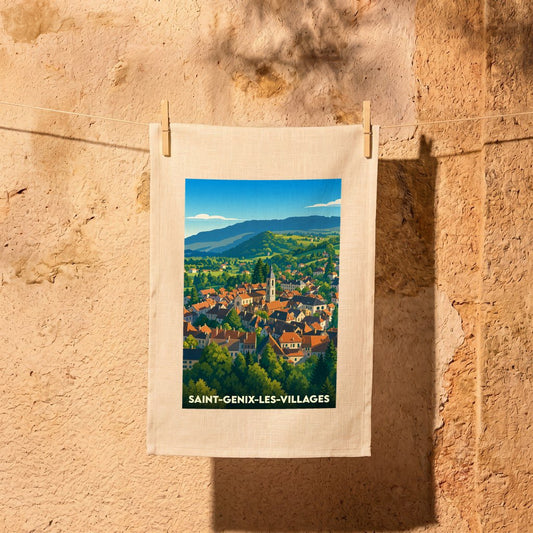 Torchon souvenir de la ville de Saint-Genix-les-Villages avec une illustration stylisée d'un village de montagne.