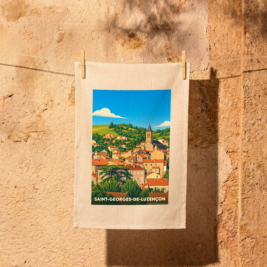 Torchon souvenir de la ville de Saint-Georges-de-Luzençon avec une illustration stylisée.