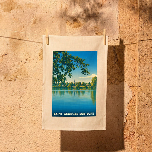 Torchon souvenir de la ville de Saint-Georges-sur-Eure avec une illustration stylisée de son paysage au bord de l'eau.