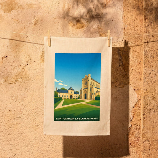 Torchon souvenir de la ville de Saint-Germain-la-Blanche-Herbe illustré d'un dessin stylisé de son abbaye.