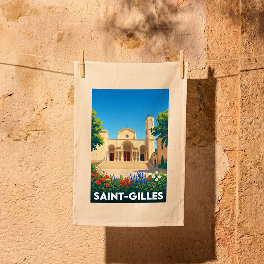 Torchon souvenir de la ville de Saint-Gilles avec une illustration stylisée de son abbaye.