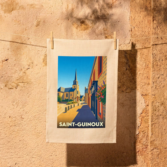 Torchon souvenir de la ville de Saint-Guinoux avec une illustration stylisée d'une rue ensoleillée menant à l'église.