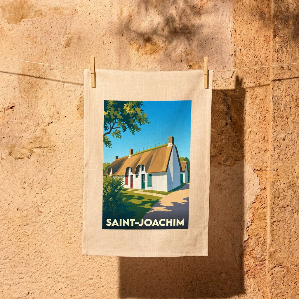 Torchon souvenir de la ville de Saint-Joachim avec une illustration stylisée d'une chaumière traditionnelle.
