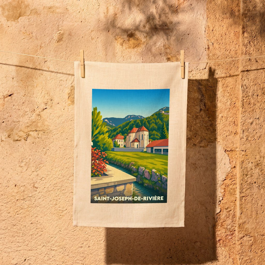 Torchon souvenir de la ville de Saint-Joseph-de-Rivière avec une illustration stylisée d'un paysage de montagne.