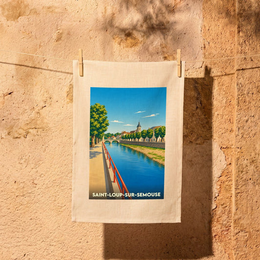 Torchon souvenir de la ville de Saint-Loup-sur-Semouse avec une illustration stylisée des bords de la rivière.