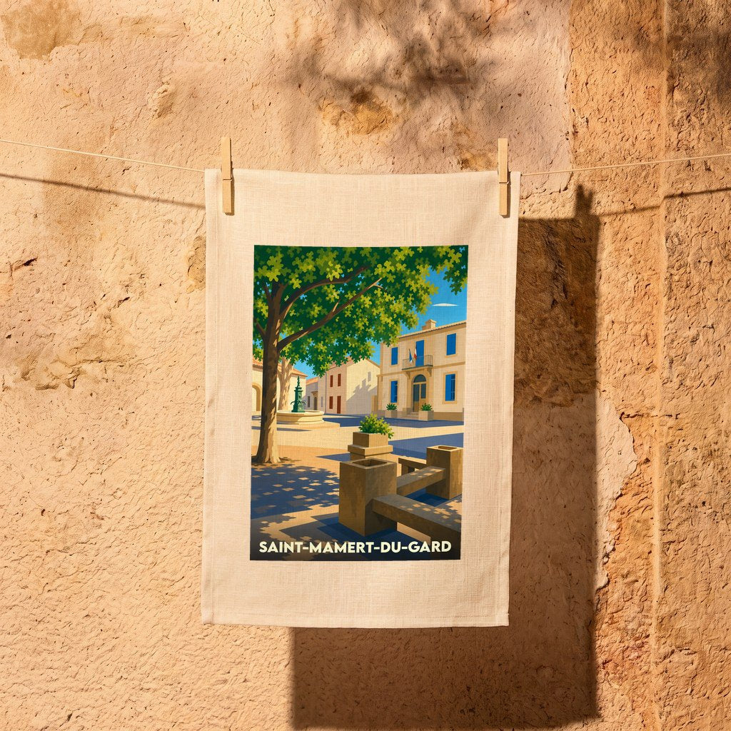 Torchon souvenir de la ville de Saint-Mamert-du-Gard illustrant une place ensoleillée au style rétro.
