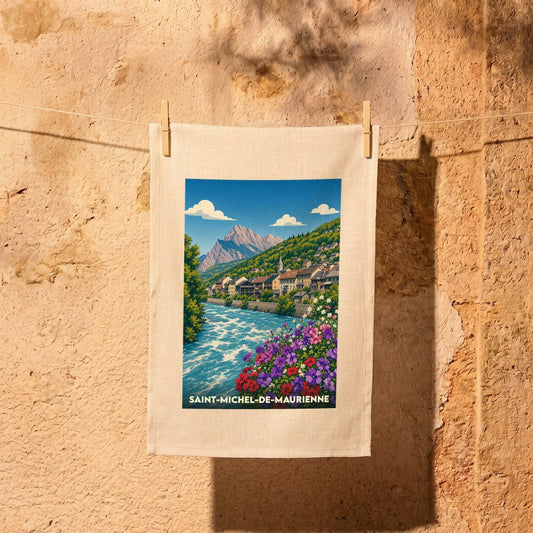 Torchon souvenir de la ville de Saint-Michel-de-Maurienne avec une illustration stylisée.