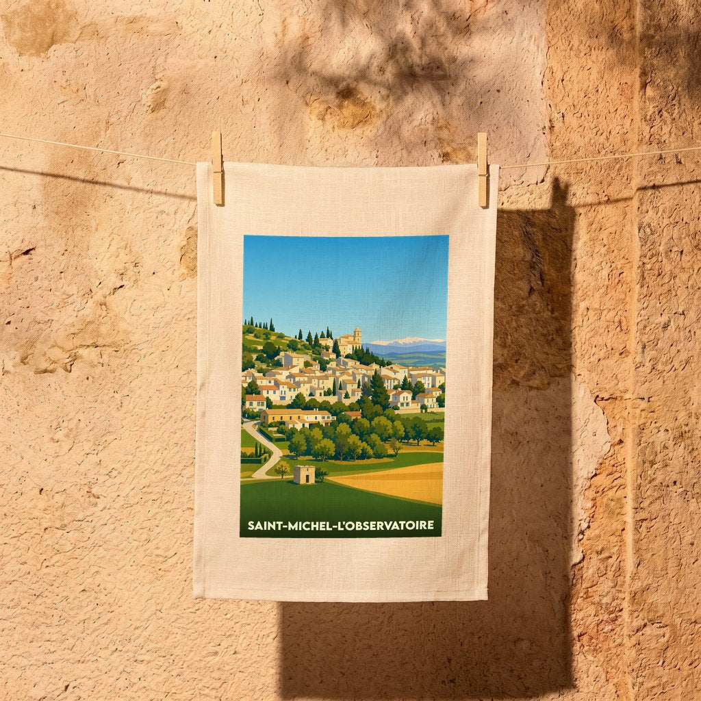 Torchon souvenir de Saint-Michel-l'Observatoire avec une illustration stylisée du village provençal.