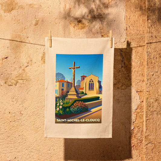 Torchon souvenir de la ville de Saint-Michel-le-Cloucq avec une illustration stylisée de son église et de son calvaire.