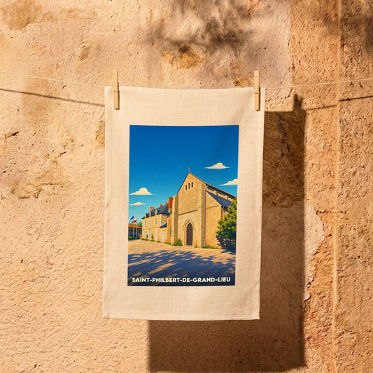 Torchon souvenir de Saint-Philbert-de-Grand-Lieu avec une illustration stylisée de l'abbatiale carolingienne.