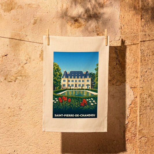 Torchon souvenir de la ville de Saint-Pierre-de-CHANDIEU avec une illustration stylisée d'un château et son jardin.