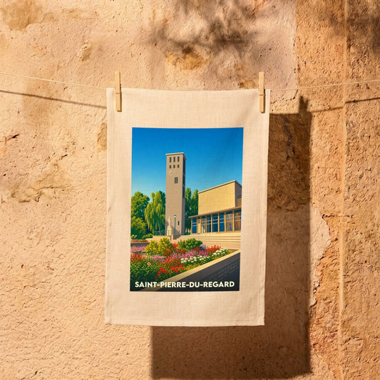 Torchon souvenir de la ville de Saint-Pierre-du-Regard avec une illustration stylisée.