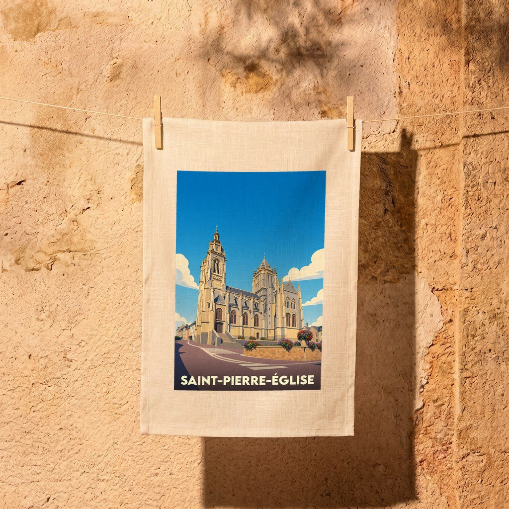 Torchon souvenir de la ville de Saint-Pierre-Église avec une illustration stylisée de son église.