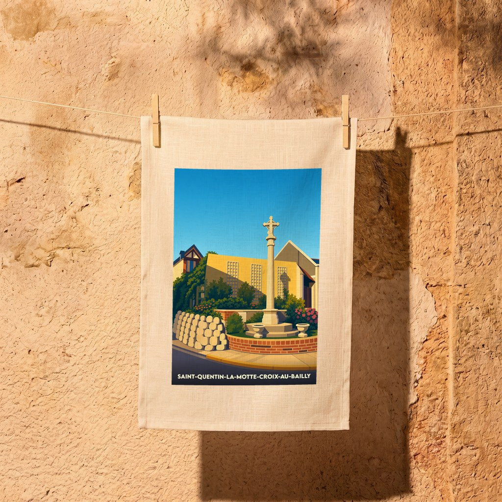 Torchon souvenir de la commune de Saint-Quentin-la-Motte-Croix-au-Bailly avec une illustration stylisée d'un calvaire.