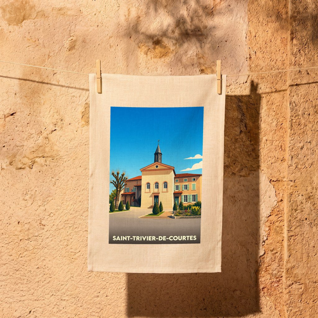Torchon souvenir de la ville de Saint-Trivier-de-Courtes avec une illustration stylisée de son église.