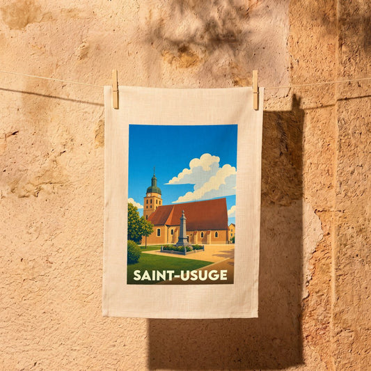 Torchon souvenir de la ville de Saint-Usuge illustré d'un dessin stylisé de son église.
