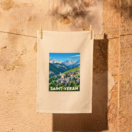 Torchon souvenir de la ville de Saint-Véran avec une illustration stylisée d'un village de montagne.