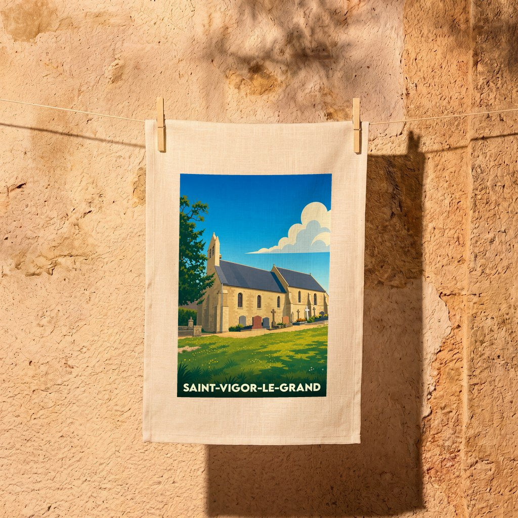 Torchon souvenir de la ville de Saint-Vigor-le-Grand avec une illustration stylisée de son église.
