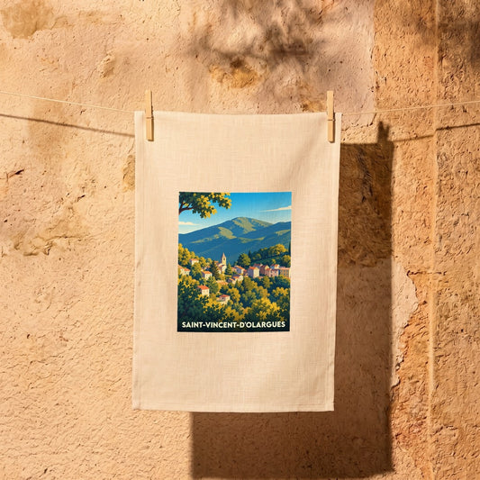 Torchon souvenir de la ville de Saint-Vincent-d'Olargues avec une illustration de paysage coloré.