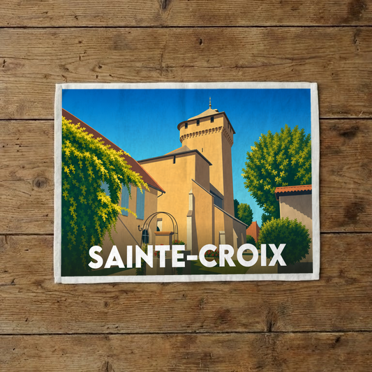 Torchon souvenir de la ville de Sainte-Croix avec une illustration stylisée de son église.