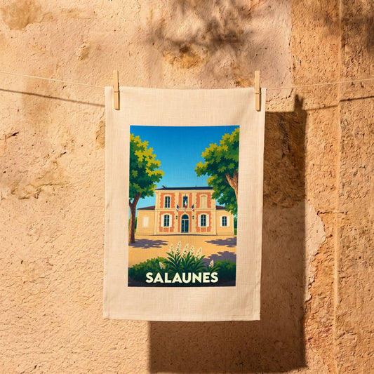 Torchon souvenir de la ville de Salaunes illustré par un dessin stylisé de sa mairie.