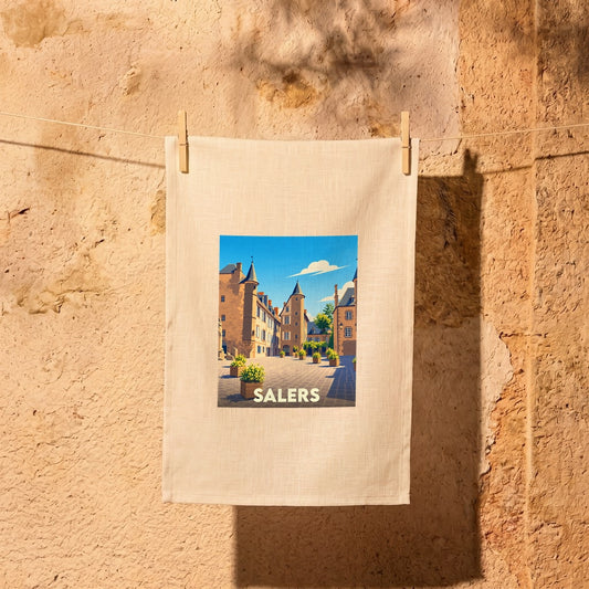 Torchon souvenir de la ville de Salers avec une illustration stylisée.