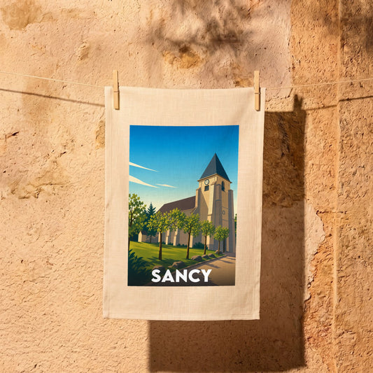 Torchon souvenir de la ville de Sancy avec une illustration stylisée de son église.
