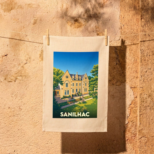 Torchon souvenir de la ville de Sanilhac avec une illustration stylisée d'un bâtiment historique.