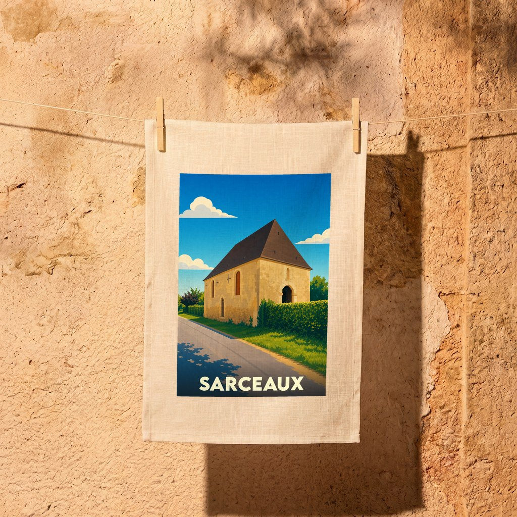 Torchon souvenir de la ville de Sarceaux avec une illustration stylisée de son église.